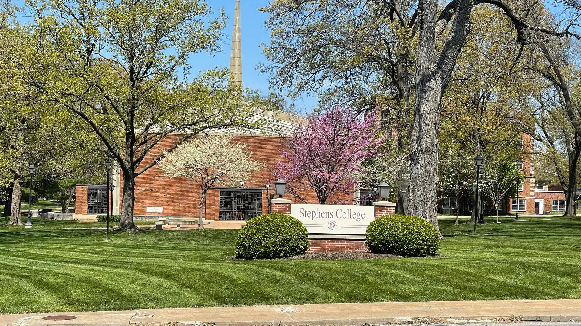 School campus with lawn mowing service near Columbia, MO.